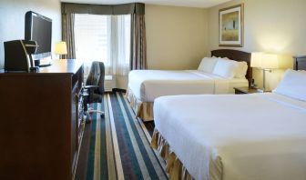 Bright and spacious day use twin room with work desk and private bathroom at Holiday Inn Conference Center Edmonton South.