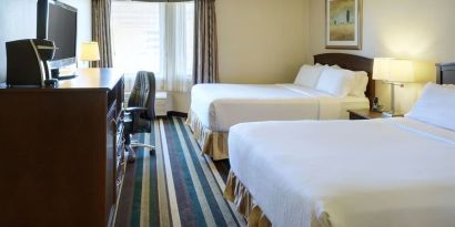 Bright and spacious day use twin room with work desk and private bathroom at Holiday Inn Conference Center Edmonton South.