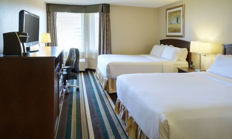 Bright and spacious day use twin room with work desk and private bathroom at Holiday Inn Conference Center Edmonton South.