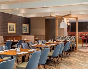 Dining area with comfortable seating at Delta St. John's Hotel & Conference Center.