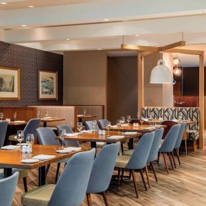 Dining area with comfortable seating at Delta St. John's Hotel & Conference Center.