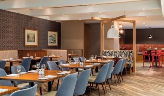 Dining area with comfortable seating at Delta St. John's Hotel & Conference Center.