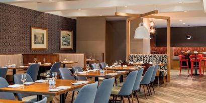 Dining area with comfortable seating at Delta St. John's Hotel & Conference Center.