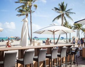 Beach bar at Riptide Hotel.