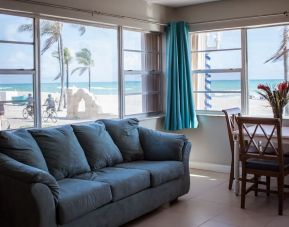 Living area inside day use room at Riptide Hotel.