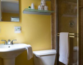 Guest bathroom with shower at Riptide Hotel.