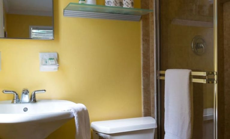 Guest bathroom with shower at Riptide Hotel.