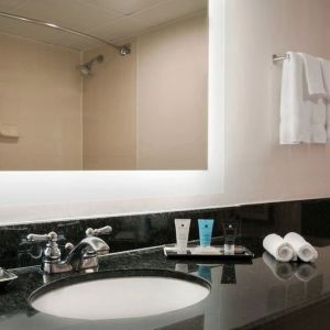 Guest bathroom with shower at Crowne Plaza Englewood.