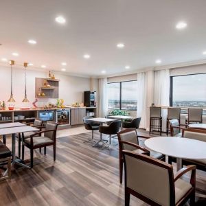 Dining area with comfortable seating at Delta Hotel By Marriott Regina.