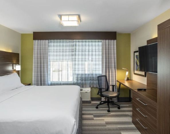 Standard day use room with TV and work desk at Holiday Inn Express & Suites Medicine Hat.