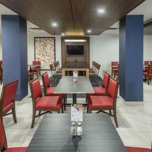 Dining area with comfortable seating at Holiday Inn Express & Suites Medicine Hat.