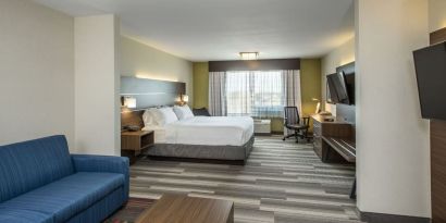 Day use suite with work desk and living area at Holiday Inn Express & Suites Medicine Hat.