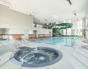 Indoor pool, jacuzzi and water slide at Holiday Inn Express & Suites Medicine Hat.