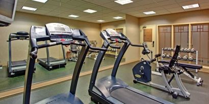 Well equipped fitness center at Holiday Inn Express & Suites Medicine Hat.