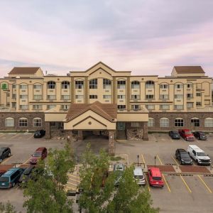 Hotel exterior with parking area at Holiday Inn Lethbridge. 