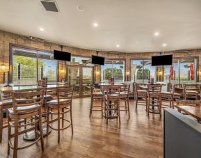 Hotel bar and lounge area at Holiday Inn Lethbridge. 