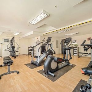 Fully equipped fitness center at Holiday Inn Lethbridge. 