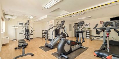 Fully equipped fitness center at Holiday Inn Lethbridge. 