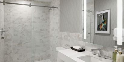 Guest bathroom with shower at Le Parc At Melrose.