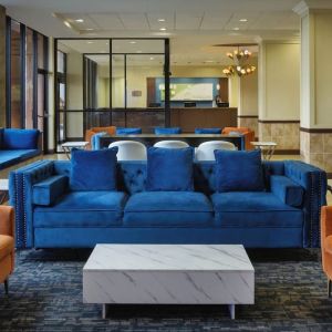 Lobby and coworking lounge at Holiday Inn Orlando SW - Celebration Area.