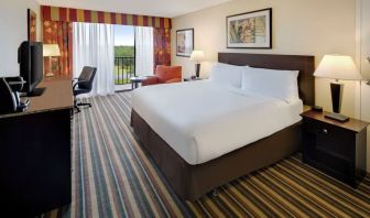 Day use room with balcony and work desk at Holiday Inn Orlando SW - Celebration Area.