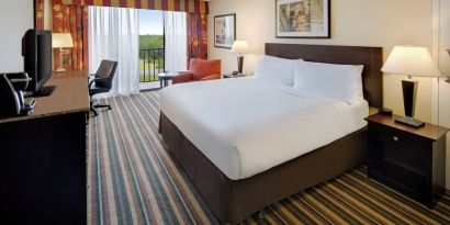 Day use room with balcony and work desk at Holiday Inn Orlando SW - Celebration Area.