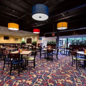 Dining area perfect for coworking at Holiday Inn Orlando SW - Celebration Area.