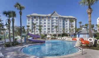 Refreshing outdoor pool with slide at Holiday Inn Express & Suites S Lake Buena Vista.