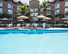 Refreshing outdoor pool at Holiday Inn Express & Suites Naples Downtown - 5th Avenue.