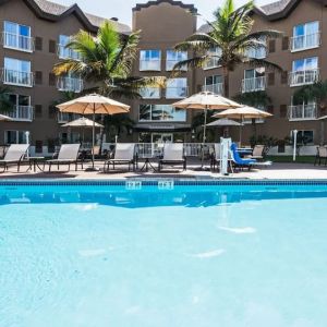 Refreshing outdoor pool at Holiday Inn Express & Suites Naples Downtown - 5th Avenue.