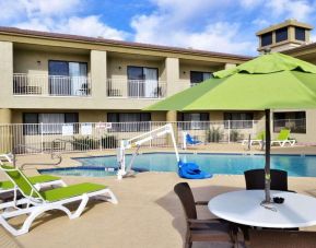 Sun loungers beside the pool at Spark By Hilton Fountain Hills Scottsdale.