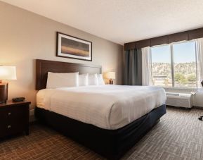 Day use room with work desk and private bathroom at Kanata Kelowna And Conference Centre.