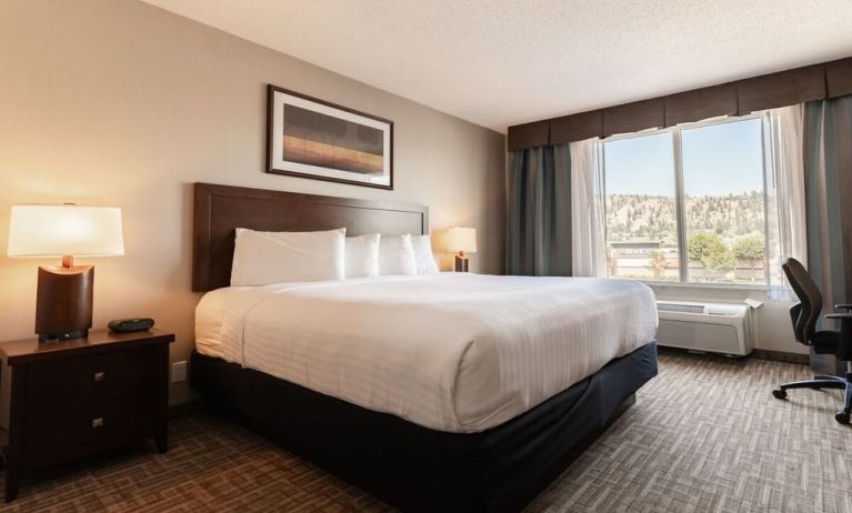 Day use room with work desk and private bathroom at Kanata Kelowna And Conference Centre.