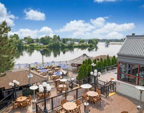 Beautiful hotel terrace with lounge sitting at Holiday Inn Peterborough-Waterfront.