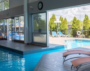 Combined indoor and outdoor pool at Holiday Inn Peterborough-Waterfront.