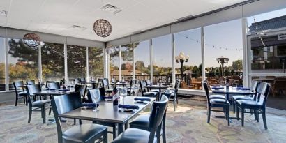 Dining area at Holiday Inn Peterborough-Waterfront.