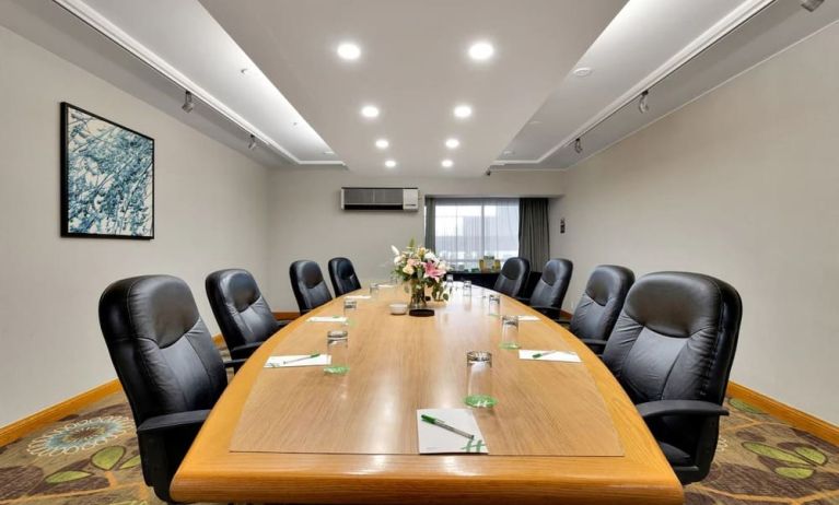 Professional meeting room with ergonomic chairs at Holiday Inn Peterborough-Waterfront.