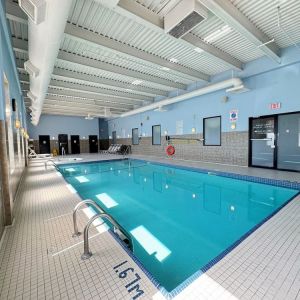 Relaxing indoor pool at Divya Sutra Plaza & Conference Centre.