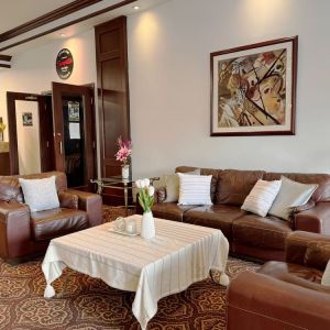 Comfortable lobby lounge at Divya Sutra Plaza & Conference Centre.