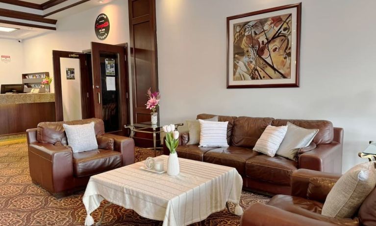 Comfortable lobby lounge at Divya Sutra Plaza & Conference Centre.