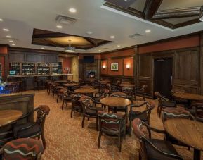 Hotel bar with lounge area at Best Western Plus Winnipeg Airport.