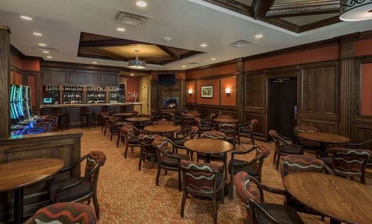 Hotel bar with lounge area at Best Western Plus Winnipeg Airport.