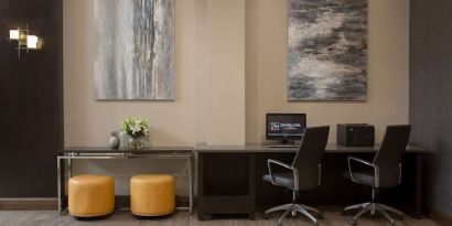 Business center with computer, printer and ergonomic chairs at The Park Hotel London.