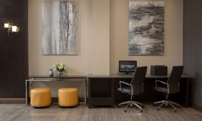 Business center with computer, printer and ergonomic chairs at The Park Hotel London.