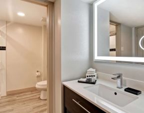 Guest bathroom with shower and free toiletries at The Park Hotel London.