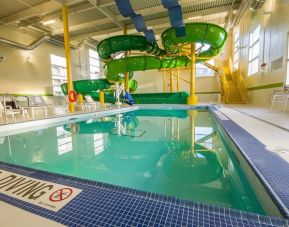 Interior heated pool with waterslides at Holiday Inn St. John's Conference Centre.