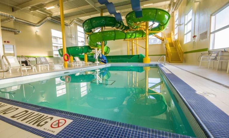 Interior heated pool with waterslides at Holiday Inn St. John's Conference Centre.