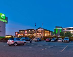 Hotel exterior and parking area at Holiday Inn St. John's Conference Centre.