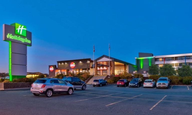 Hotel exterior and parking area at Holiday Inn St. John's Conference Centre.