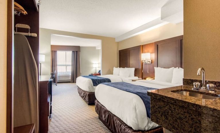 Day use twin room with work desk at Quality Inn Hotel Medicine Hat.